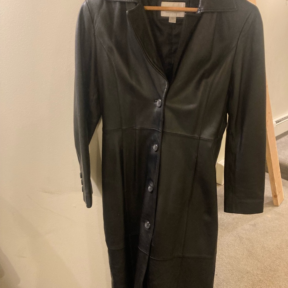 Long women's leather coat.